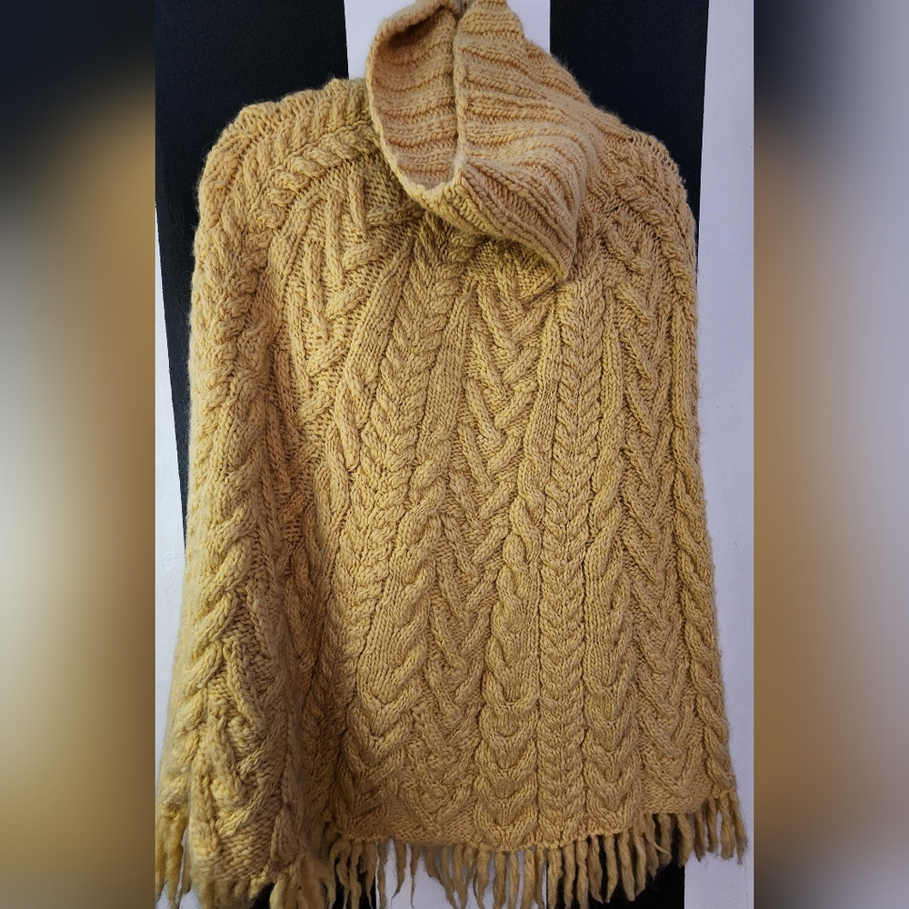 DKNY. Pancho sweater. Very warm.